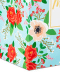 Extra Large Mothers Day Gift Bag With Tissue Paper In Bright Blue Featuring Red Roses And Green Foliage, floral corner view