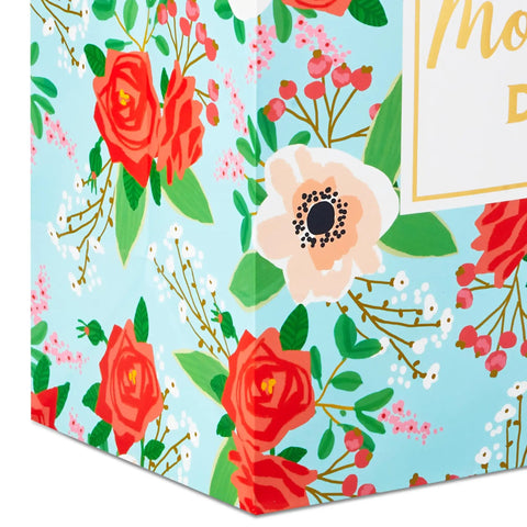 Extra Large Mothers Day Gift Bag With Tissue Paper In Bright Blue Featuring Red Roses And Green Foliage, floral corner view