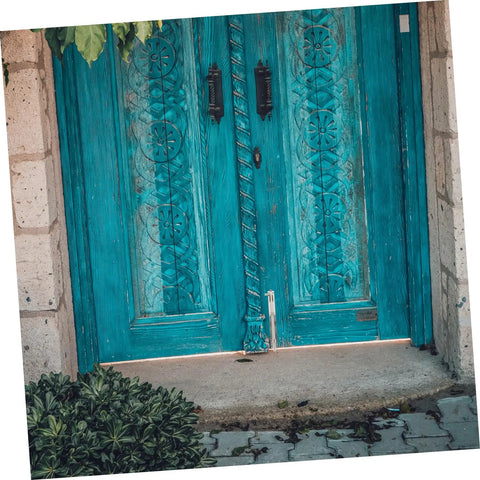 Heavy Duty Stainless Steel Sliding Gate Latch And Barn Shed Door Security Bar That Delivers Rock Solid Lockdown Security While Shaking Off Rain Or Shine on bright blue wooden door.