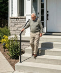 Pro Level Wrought Iron Hand Rails For Outdoor Steps 2 Or 3 Adjustable Indoor Outdoor Stair Railing Kit Rock Solid Build used by senior on steps.