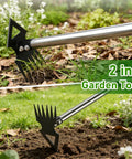 Close-up of Beefy 56 Inch Long Handle Weed Puller Tool Dual Head 2 In 1 Weed Rake And Garden Hoe in use in a garden. 