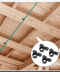 Installed view of Briwoody 1/2 in PEX pipe clamps, butterfly style, black, 50-pack for suspending PEX, copper, or CPVC tubing