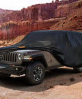 Jeep covered with 7 Layer Heavy Duty Car Cover For Jeep Wrangler 4 Door JK JL Unlimited Outdoor All Weather in rocky desert