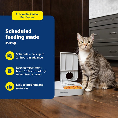 Smooth Operator Two Meal Automatic Pet Feeder With Dial Timer For Dogs And Cats, gray feeder with a cat beside it, showing two compartments.