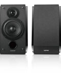 Front view of R1850DB Dope Active Bookshelf Speakers with Bluetooth and Optical Input built-in amplifier for home studio.