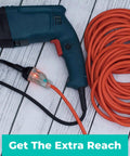 Heavy Duty Outdoor Extension Cord 50 Feet 16 AWG SJTW 16/3 Lighted Power Cord Bright Orange ETL with tool on wooden deck