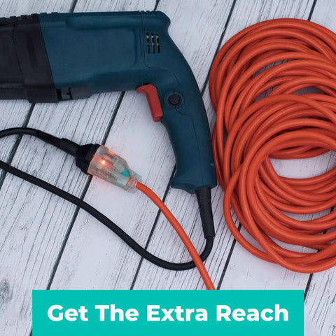 Heavy Duty Outdoor Extension Cord 50 Feet 16 AWG SJTW 16/3 Lighted Power Cord Bright Orange ETL with tool on wooden deck