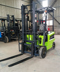 3 Ton Heavy Duty Electric Forklift Industrial Workhorse With Multi Stage Mast For Warehouse Racking And Container Loading in a warehouse.