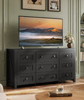 Top Shelf 9 Drawer Farmhouse TV Stand With Badass Storage Space And Rustic Barn Accents Built For Chill Living Rooms Holds Big Screens Up To 70 Inches In Sleek Black showcasing deep storage and large TV in modern living room.
