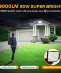 80W Dusk To Dawn Flood Light 9000 Lumens Led Security Beam With Photocell Ip65 Waterproof 4 Head Adjustable Outdoor Fixture For Garage Yard Crushing The Night Cool White illuminating a home entrance at night with a person walking.