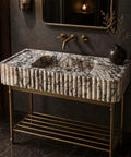 Calacatta Viola Marble Fluted Sink, Hand-Carved Rectangular Bathroom Vanity Basin with gold metal stand and dark background.