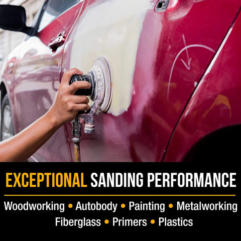 Person using dual-action sander with Six Inch Wet Or Dry Sanding Discs Variety Pack 20 Pc Set on red car panel.
