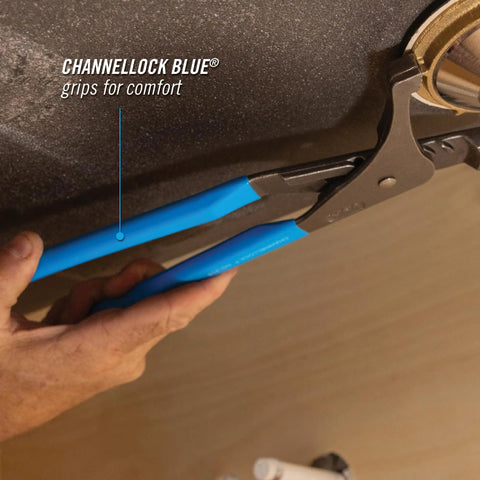 Adjustable Oil Filter Pliers 15 Inch With Six Position Slip Joint being used for auto maintenance, blue grips visible