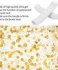 Anti Slip Silicone Bike Brake Grips With Waterproof Lever Covers, white grips on silica gel background for cycling
