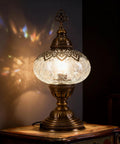 Cracked Clear Moroccan Mosaic Table Lamp With Handmade Turkish Glass Light Bulb Included, illuminating a dark room