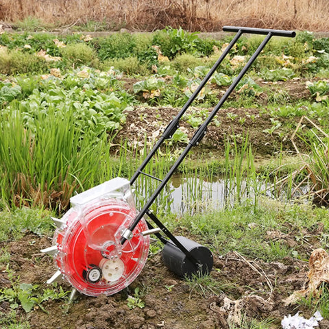 Garden Roller Seeder Manual Planter With Equidistant Spacing And 9 Nozzles Walk Behind Row Crop Planter in a garden setting