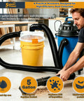 SplashPower Low Profile Cyclone Dust Separator For Shop Vac with yellow 5-gallon bucket, black hose, and user vacuuming sawdust.