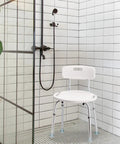 Shower Chair With Back For Elderly And Disabled, Lightweight Aluminum Bath Seat Supports Up To 300 Lbs in a white tiled shower.