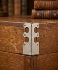 Heavy Duty Metal Corner Protectors Set for Jewelry Boxes Tables and Trunks, antique metal edge guard on wooden corner.