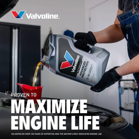 Valvoline Advanced Full Synthetic 0W-20 motor oil, 5 qt bottle being poured into a car engine.