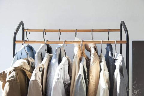 Kickass Rolling Wardrobe Rack With Staggered Wooden Bars And Roomy Bottom Shelf Built Tough With Steel Frames Delivers The Ultimate Flex For Portable Closet Setup Anywhere Glides On Smooth Casters
