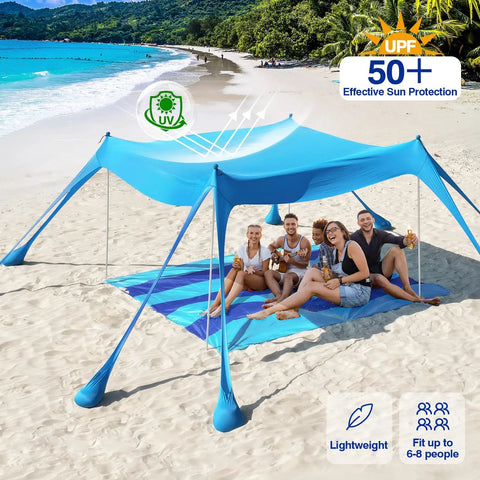 Group relaxing under Beach Tent 10 By 10 Ft Portable Shade Shelter With 8 Sandbags and UPF 50 Plus Sun Defense Sky Blue on beach