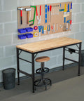Heavy Duty Adjustable Height Workbench With Built In Power Outlets And Solid Rubber Wood Top Rock Solid Two Thousand Pound Capacity Garage Beast For Shop Projects And Buildouts with tools and storage.