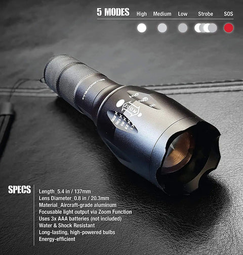 TacLight Bright LED Flashlight With Zoom And Five Modes 100000 Hour Bulb Water Resistant Mini Torch on black surface
