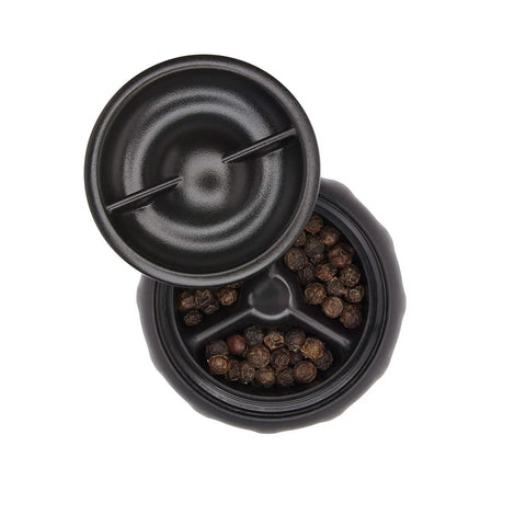 Top view of open compartment with black peppercorns from Stainless Steel Salt And Pepper Grinder Set For Kitchen And Table Easy Refill Top Grinding Mechanism For Clean Counters Adjustable Coarseness From Fine To Coarse Sleek Durable Grinders For Everyday Cooking And Seasoning