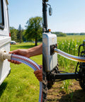 Beefy Ten Foot Steel Wire Reinforced PVC Vacuum Hose With One And Quarter Inch Inner Diameter And One And Half Inch Outer Diameter in use