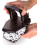 Person holding 2 Hole Punch For Papers With 28 Sheet Capacity, Durable Metal Construction, Comfortable Padded Handle, Easy Lock For Storage, Alignment Guide, Black Office Puncher