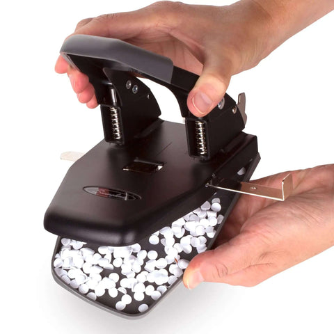 Person holding 2 Hole Punch For Papers With 28 Sheet Capacity, Durable Metal Construction, Comfortable Padded Handle, Easy Lock For Storage, Alignment Guide, Black Office Puncher