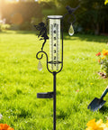 Solar Powered Glass Weather Station Rain Gauge Garden Stake With Freeze Proof Design Fairy Garden Decor Outdoor Yard Crystal Pendant Rain Meter Easy Lawn Rain Reading And Garden Swag in lawn with flowers.