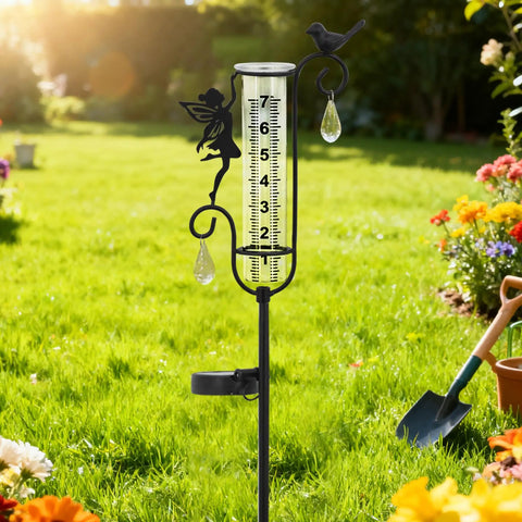 Solar Powered Glass Weather Station Rain Gauge Garden Stake With Freeze Proof Design Fairy Garden Decor Outdoor Yard Crystal Pendant Rain Meter Easy Lawn Rain Reading And Garden Swag in lawn with flowers.