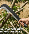 Person using Beastly Heavy Duty Yard Work Machete With Curve Blade For Cutting Trees And Brush Clearing Billhook Sickle Garden Tool