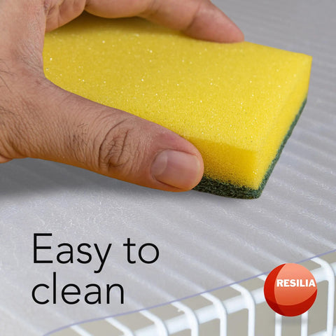 Heavy Duty Waterproof Closet Shelf Liner For Wire Shelving 20 Inch Wide By 25 Foot Long Clear PVC Cover being cleaned with sponge