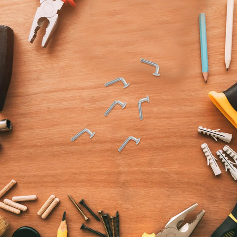 Heavy Duty Galvanized M5 Pallet Rack Pins And Safety Bolts For Warehouse Shelving Units on a wooden table with tools