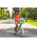 Child riding Bluey Themed 12 Inch Girls BMX Bike With Coaster Brake, Steel Frame, Training Wheels, Colorful Decals And Bar Pad