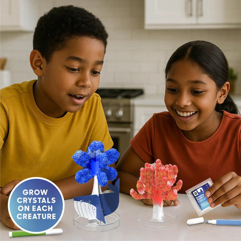 Children using Deep Sea Crystal Grow Kit for Kids - 32-Piece STEM Chemistry Lab to Grow Colorful Crystals on 8 Sea Creatures.