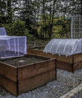 4x10 Ft Garden Bug Barrier Netting For Pest Protection installed over raised beds, shielding vegetables from insects and birds.