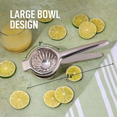 Go-To Stainless Steel Lemon Squeezer with large bowl, surrounded by sliced limes, showing 3" and 8.6" dimensions on a green background.