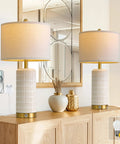 Set Of 2 Ceramic Table Lamps 24 Inch For Nightstands And Living Rooms Farmhouse Chic Modern Style White Finish Bedroom Bedside End Tables Ambient Lighting With Soft Glow; shown on wooden sideboard with decorative items.