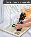 Two Pack Silicone Sink Protectors With Trellis Pattern Non Slip Durable Kitchen Mat 13 By 11 Inches being cleaned in sink