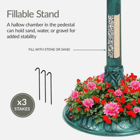 Fillable stand of the Solar Outdoor Bird Bath With Resin Pedestal Fountain In Green Yard Garden Decor 0.8 Gallon Basin Planter Base Feeder And Fillable Stand Weather Resistant Lantern Light For Nighttime Easy Setup For Bird Lovers, showing the interior chamber and pink flowers on the base.