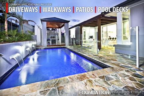 Pro Grade 5 Gallon Solvent Based Concrete Sealer drops a matte look on slate pool deck near water features.