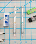 GraphGear 1000 Mechanical Pencil 0.5mm With Lead Hardness Indicator And Dual Action Retractor Black Barrel shown on drafting mat