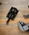 Heavy Duty Adjustable Furniture Leveling Feet With Right Angle Side Mount For Cabinets, Workbenches, And Wardrobes, on wood table