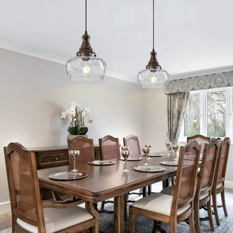 Vintage Glass Pendant Light Kitchen Island with Walnut Wood 9.8in hanging over a dining table with elegant chairs.