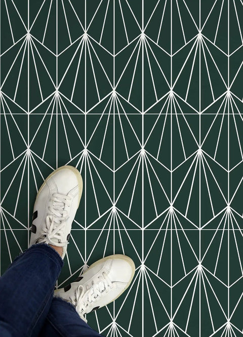 Person wearing white sneakers standing on Beryl Peel And Stick Floor Tiles Emerald Green Geometric Vinyl For Easy DIY Install