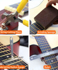 All-In-One 106-Piece Guitar Tool Kit with capo, strings, picks. String cutting pliers, grinding sponge, radius gauge, ruler on guitar